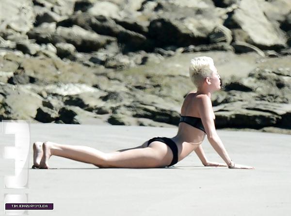22P Miley Cyrus yoga at the beach 