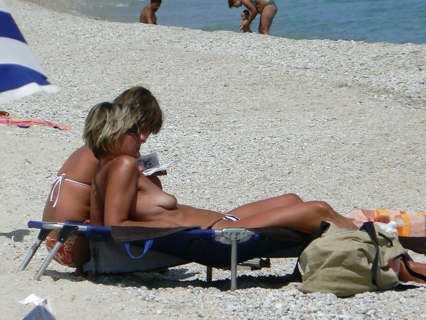 13P Topless on the beach 1