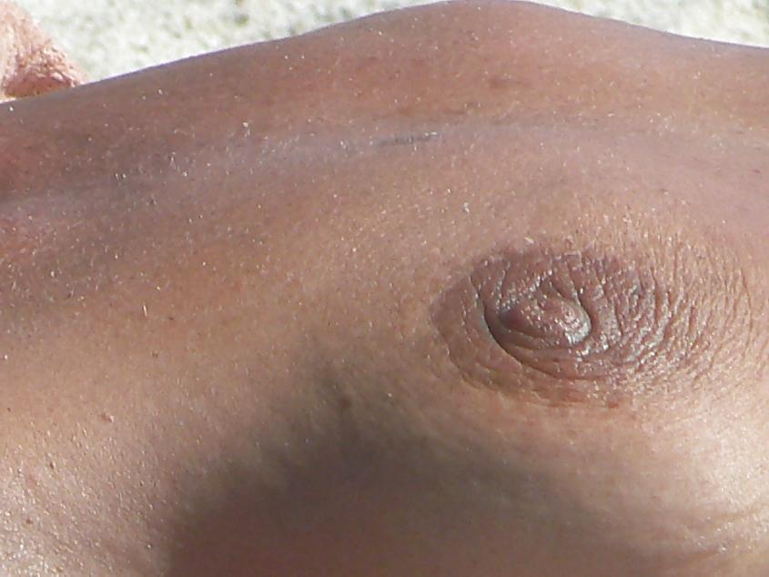 13P Topless on the beach 1