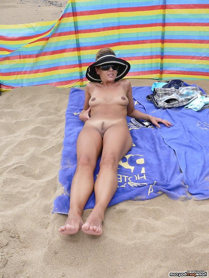 14P Showing off on the beach