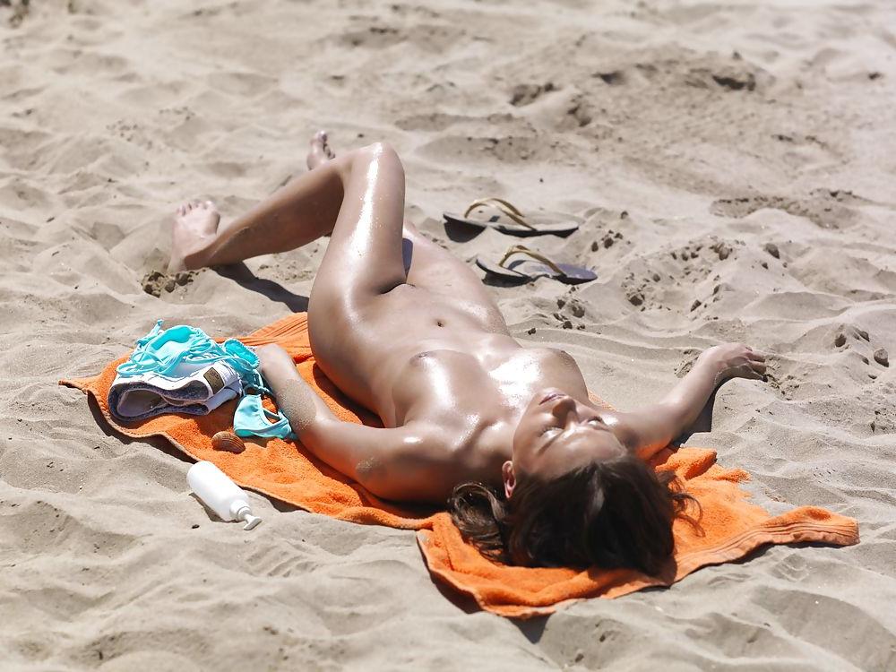 24P Outdoors naked on the beach