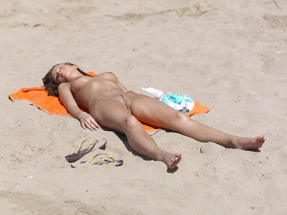 24P Outdoors naked on the beach