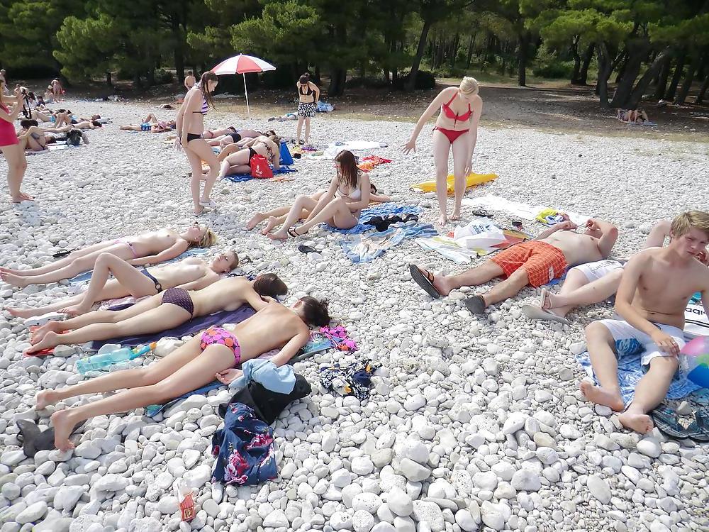 24P Topless teens on the beach - COMMENT THEM DIRTY FOR MORE