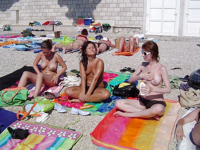 24P Topless teens on the beach - COMMENT THEM DIRTY FOR MORE