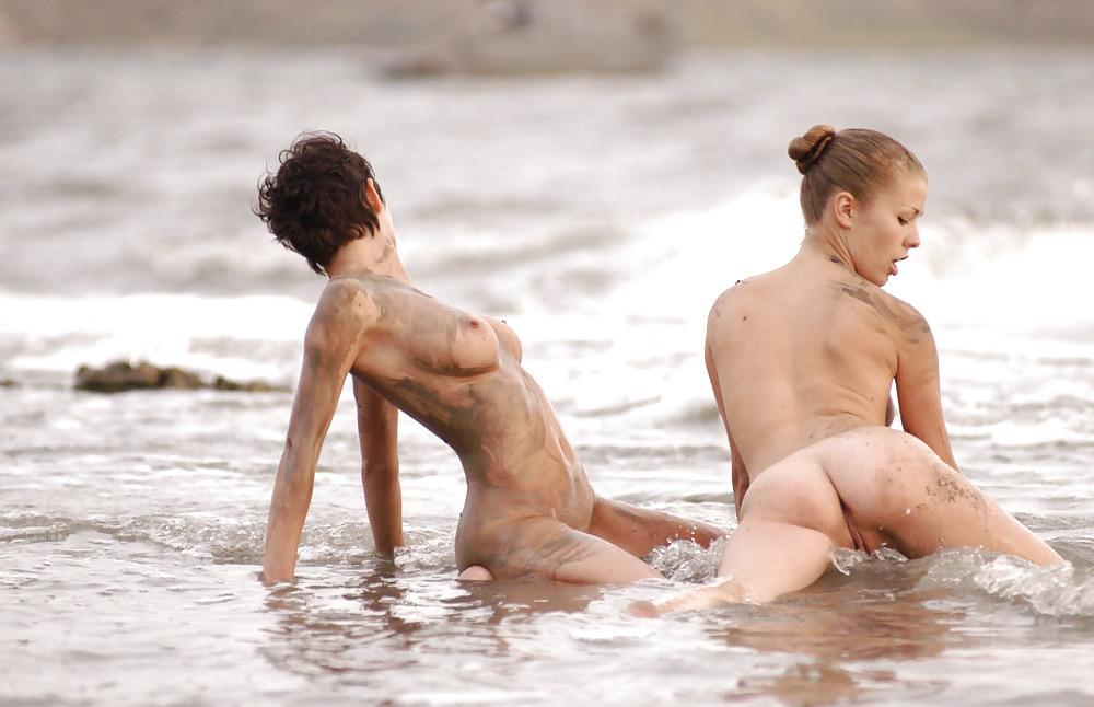 16P Two hotties getting muddy on the beach