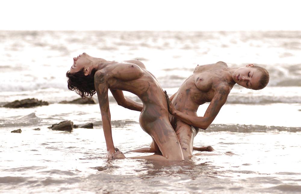 16P Two hotties getting muddy on the beach