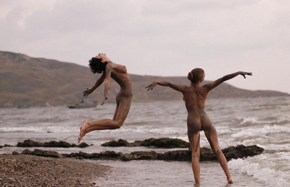 16P Two hotties getting muddy on the beach