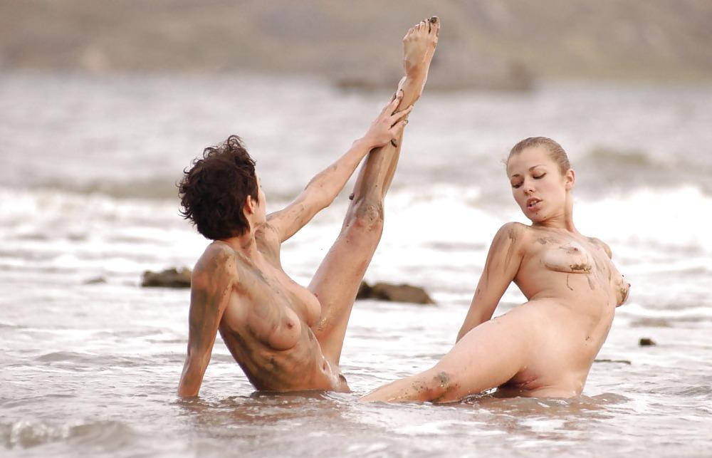 16P Two hotties getting muddy on the beach