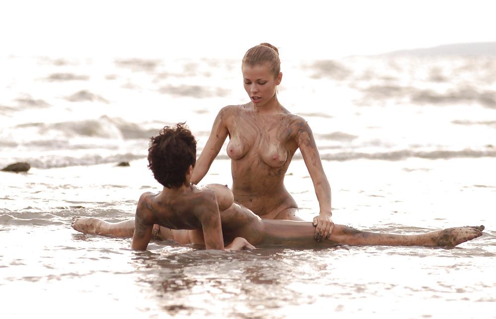 16P Two hotties getting muddy on the beach