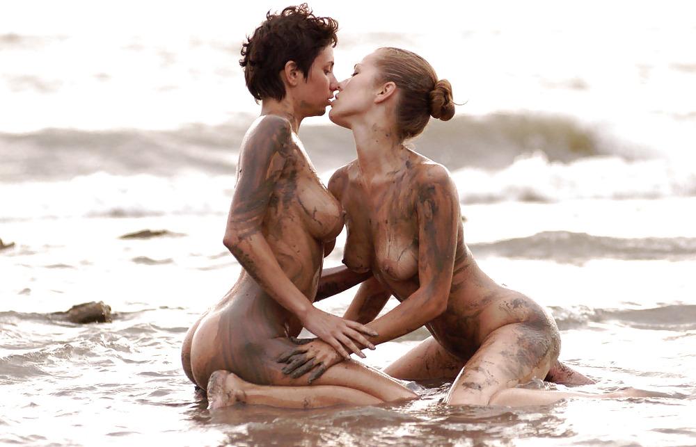 16P Two hotties getting muddy on the beach