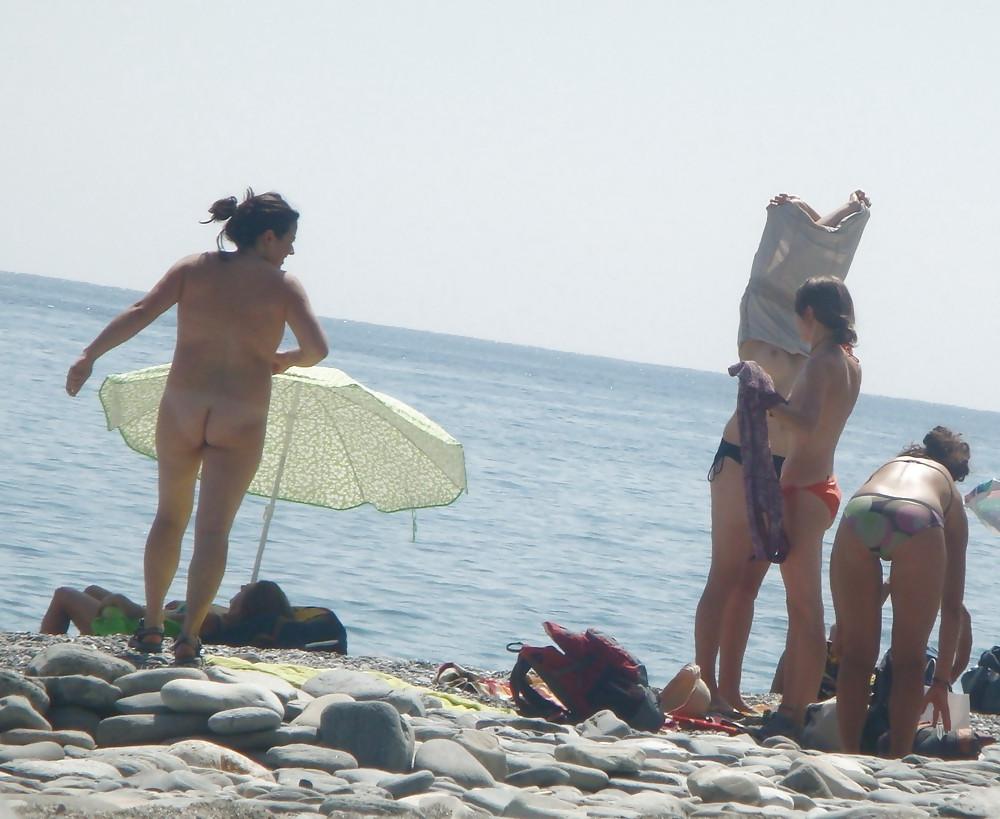 25P Beach stripping Getting nude at beach Undressing beach