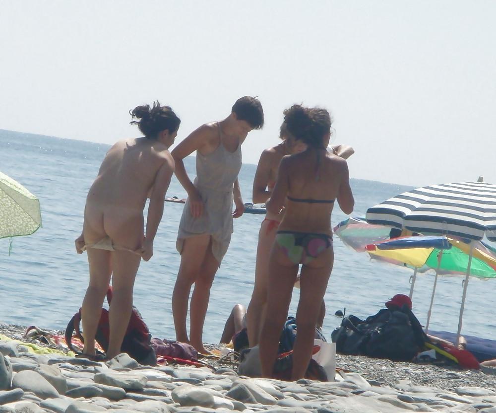 25P Beach stripping Getting nude at beach Undressing beach