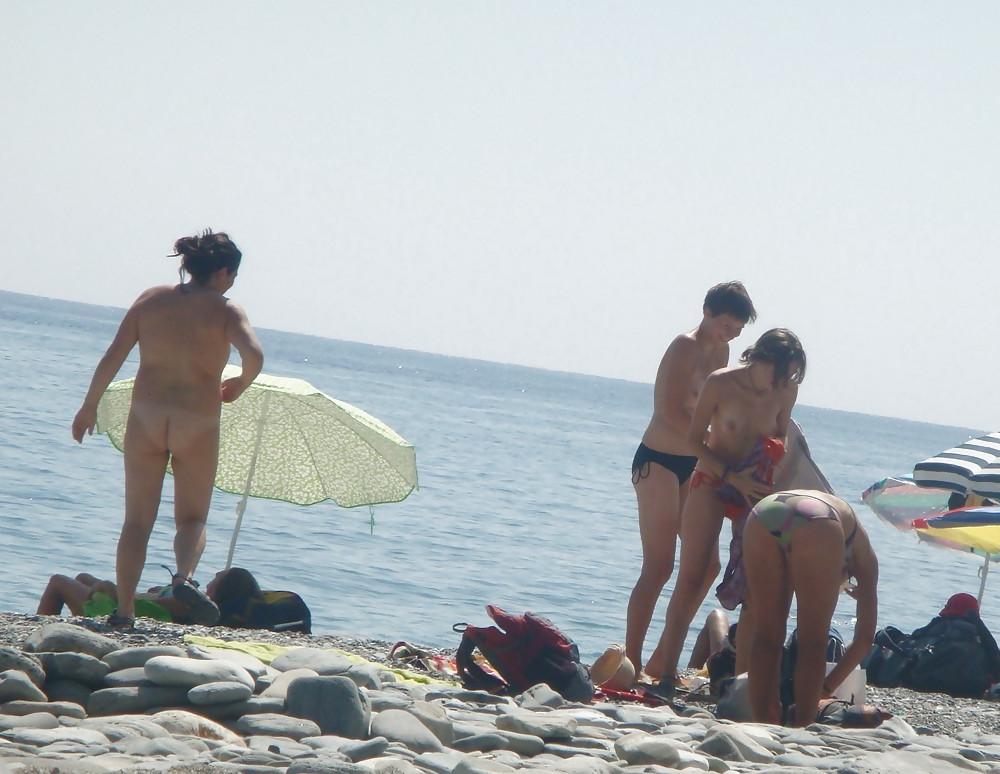 25P Beach stripping Getting nude at beach Undressing beach