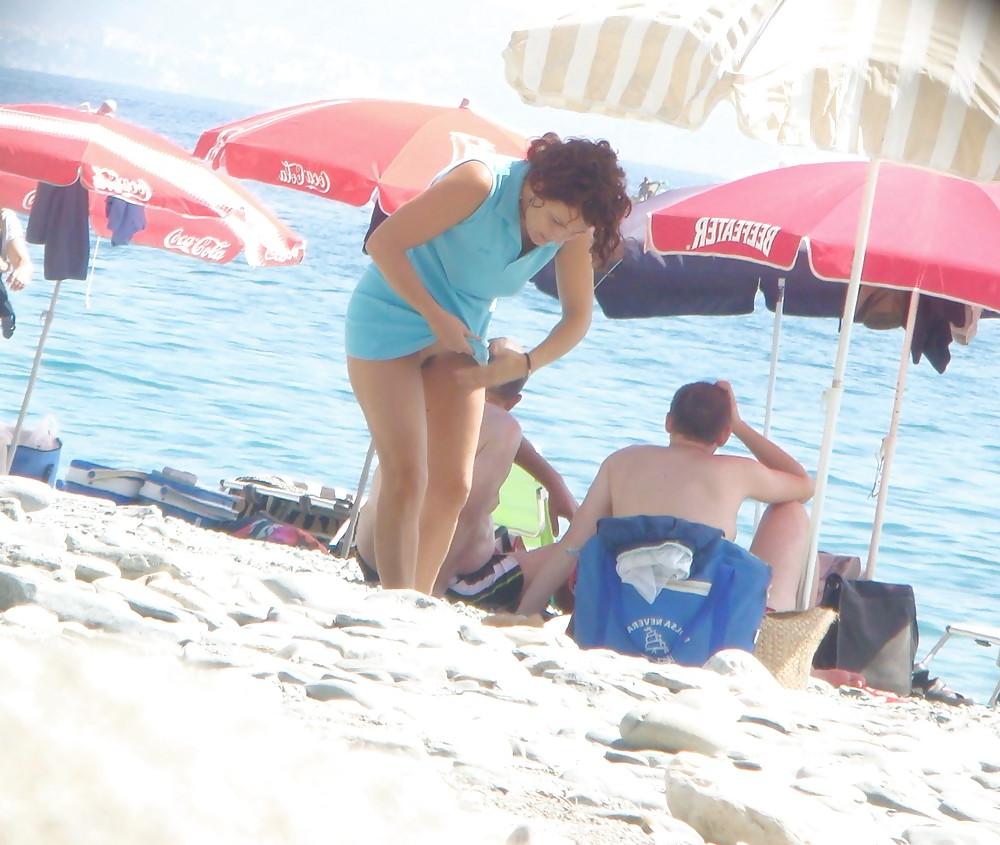 25P Beach stripping Getting nude at beach Undressing beach