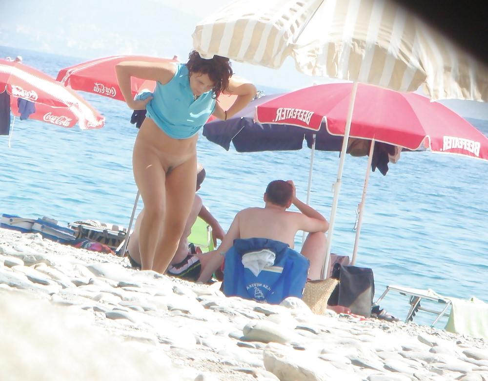 22P Beach stripping Getting nude at beach Undressing beach