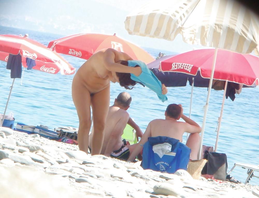 22P Beach stripping Getting nude at beach Undressing beach