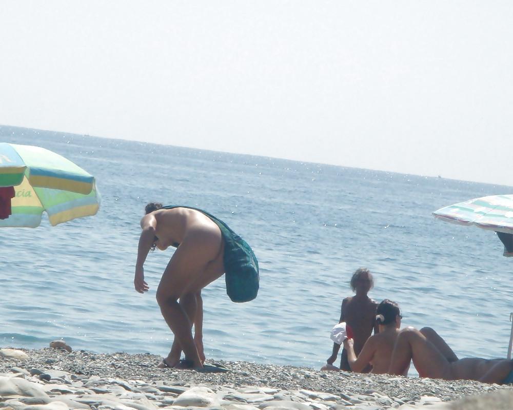 22P Beach stripping Getting nude at beach Undressing beach