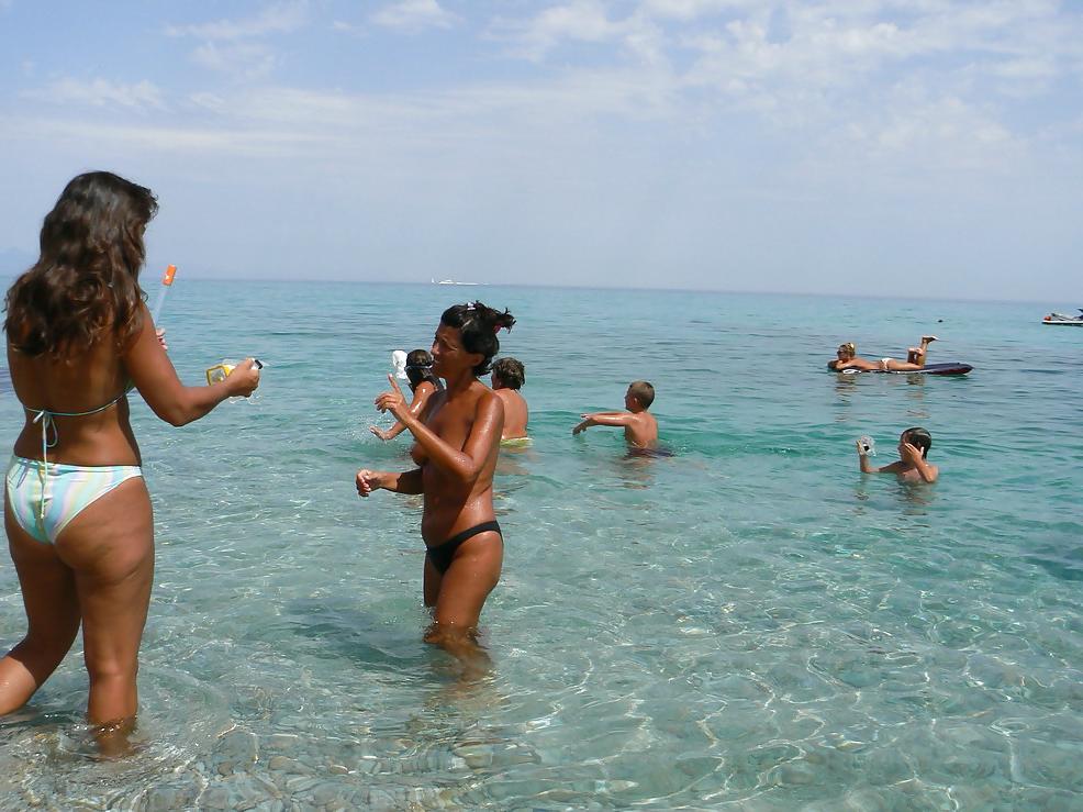 10P Topless on the beach 3