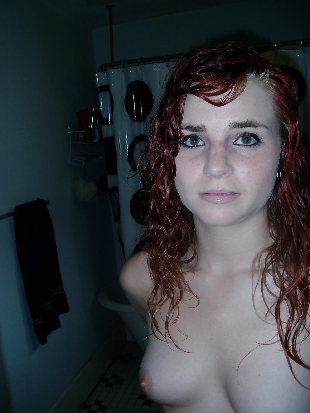 25P Young redhead in pants and nacked