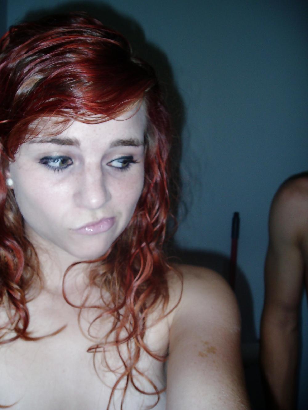 25P Young redhead in pants and nacked
