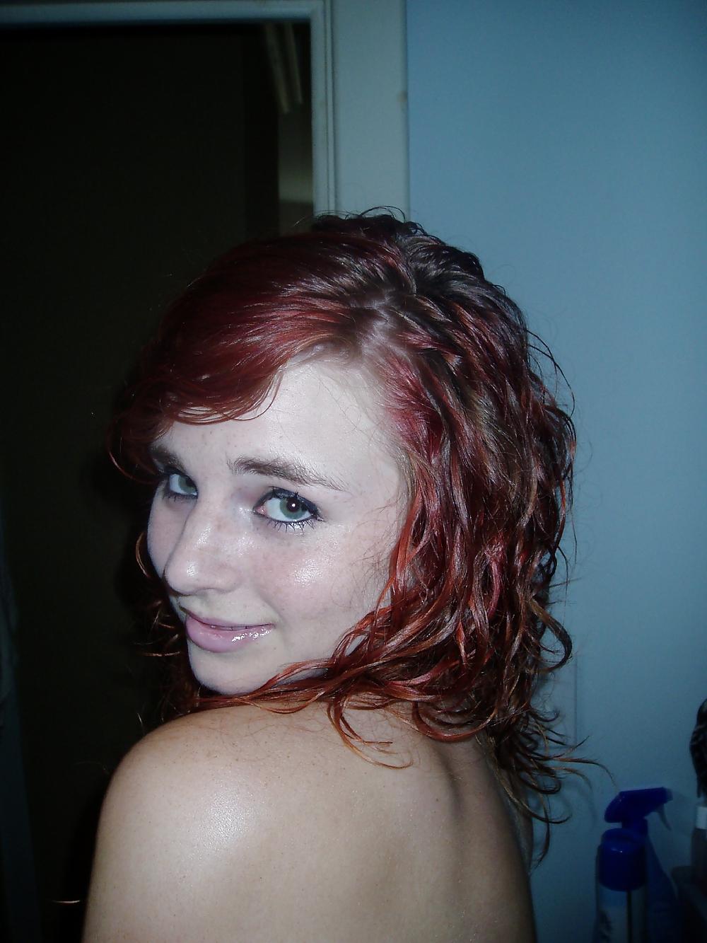 25P Young redhead in pants and nacked