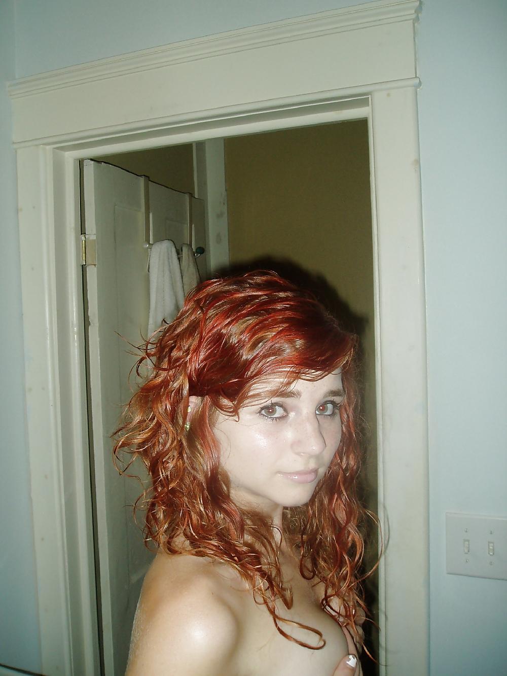 25P Young redhead in pants and nacked