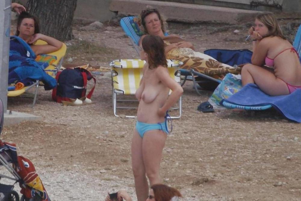 25P Beach undressing 5.