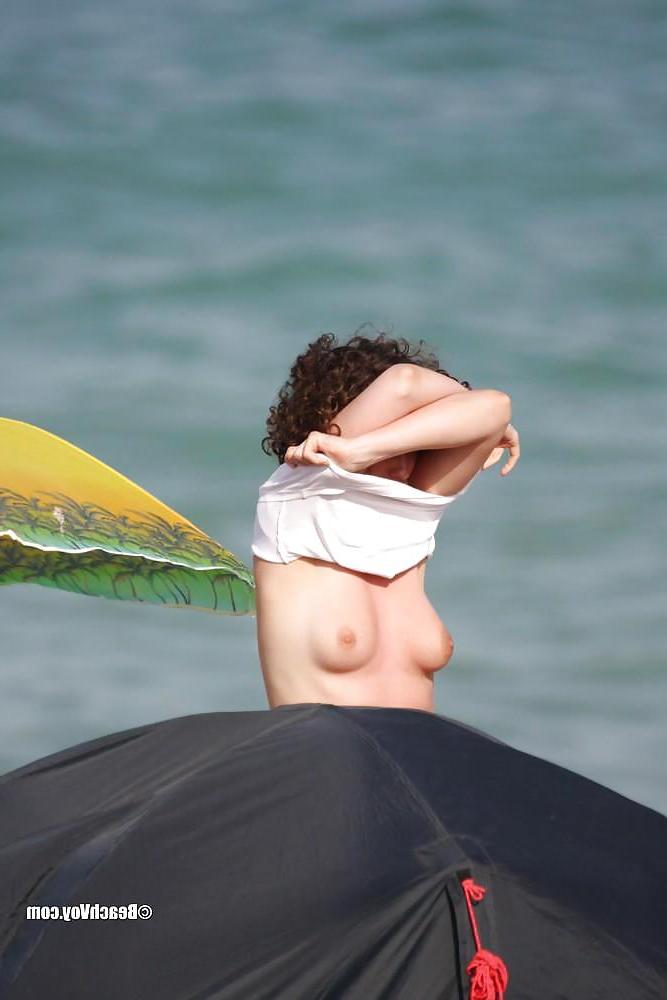 25P Beach undressing 5.