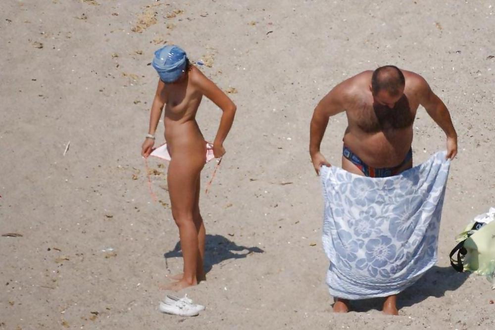 25P Beach undressing 5.