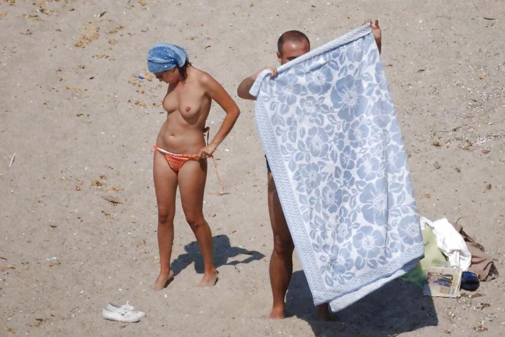 25P Beach undressing 5.