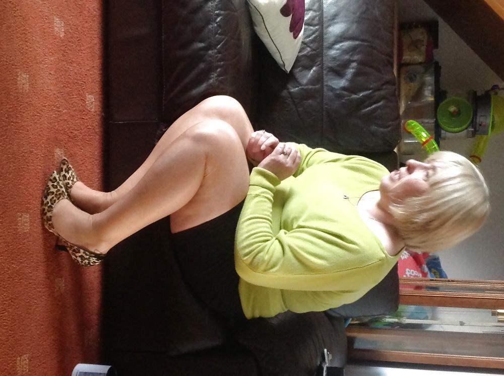 14P Helga shows her legs in sexy hot nylons