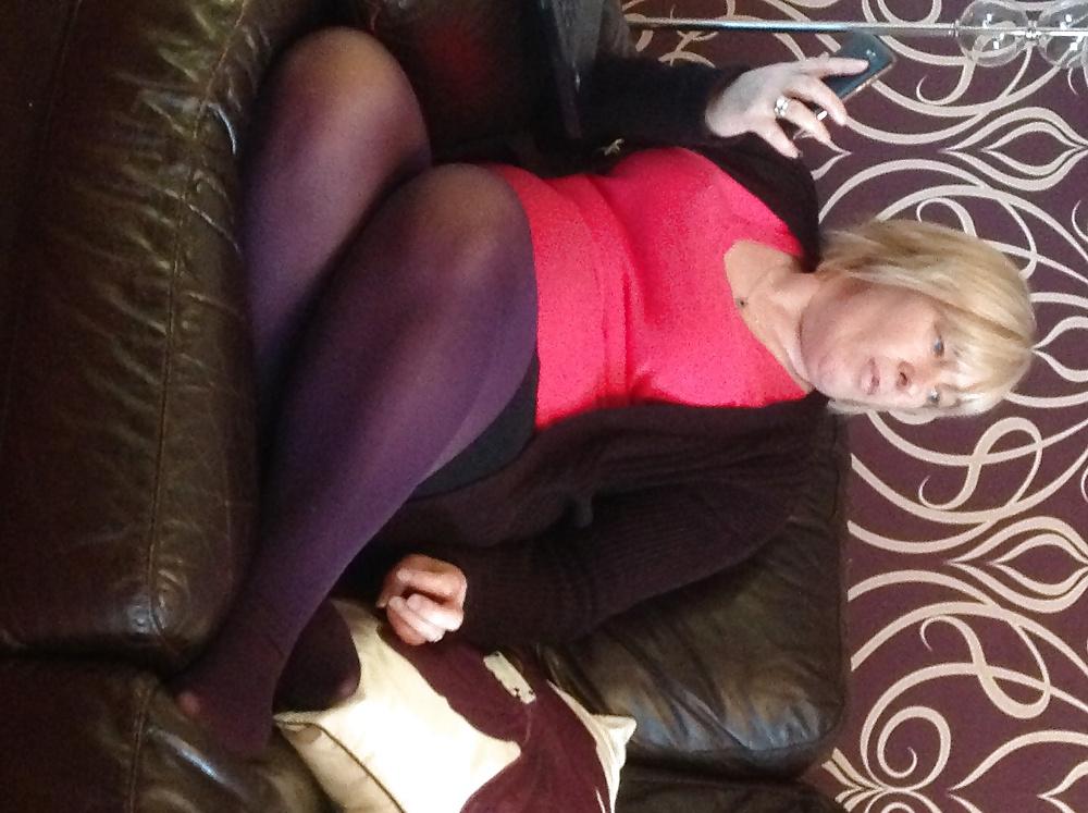 14P Helga shows her legs in sexy hot nylons