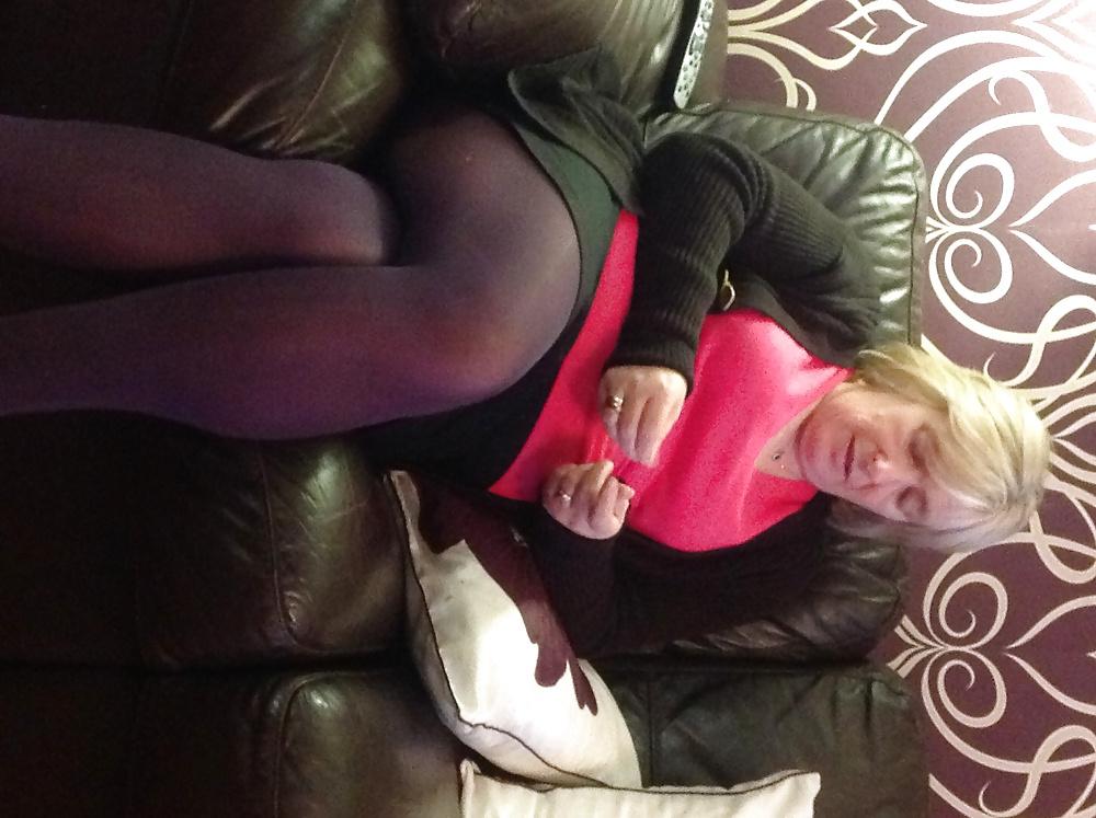 14P Helga shows her legs in sexy hot nylons