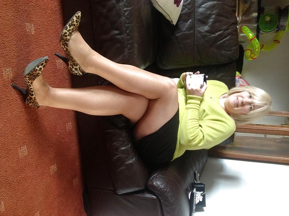 14P Helga shows her legs in sexy hot nylons