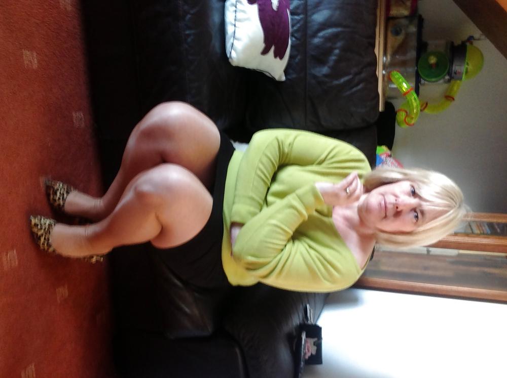 14P Helga shows her legs in sexy hot nylons