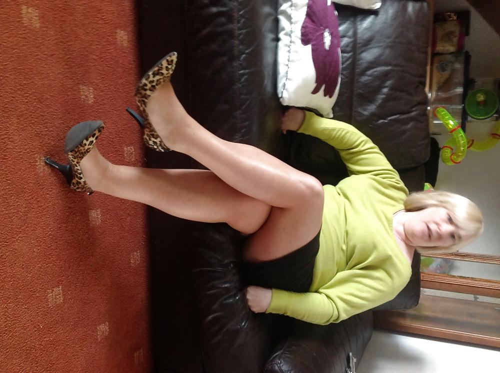 14P Helga shows her legs in sexy hot nylons