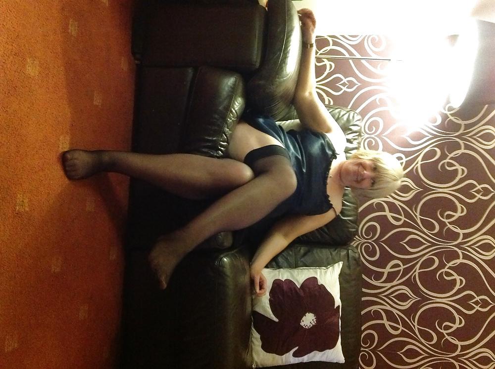 14P Helga shows her legs in sexy hot nylons