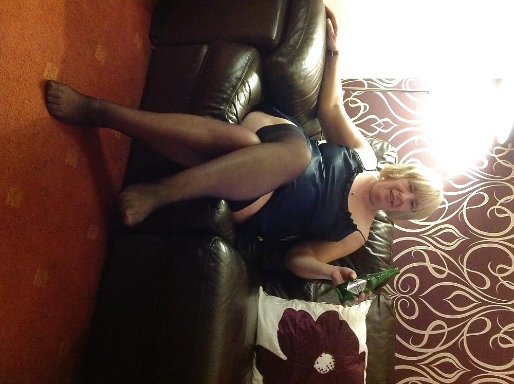 14P Helga shows her legs in sexy hot nylons