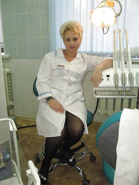 20P Russians mature woman with sexy legs!