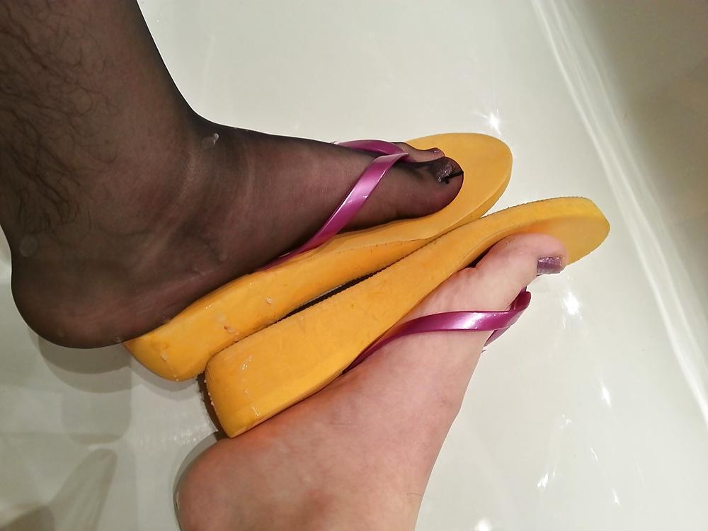 10P My feet with nylons, polish and my mother's flip flops