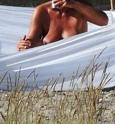 14P Sluts secretly photographed on the beach