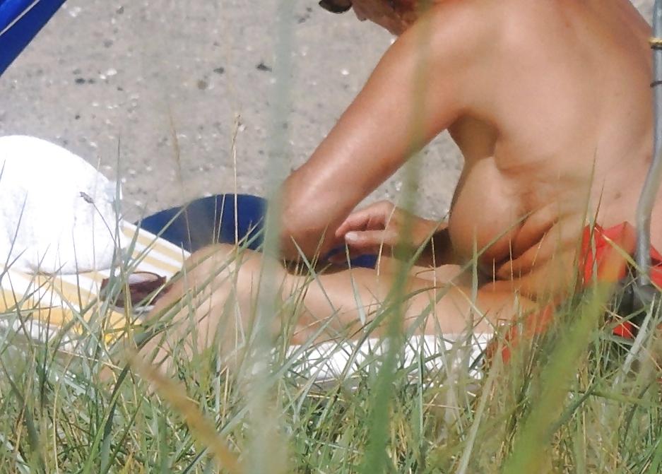 14P Sluts secretly photographed on the beach