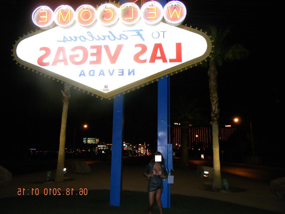 12P NINA latina flashing at the Las Vegas sign