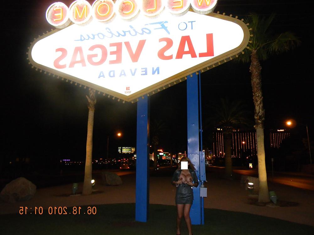 12P NINA latina flashing at the Las Vegas sign