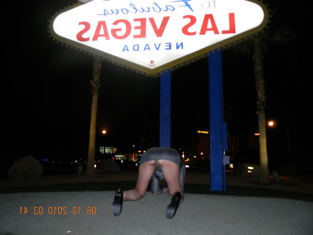 12P NINA latina flashing at the Las Vegas sign