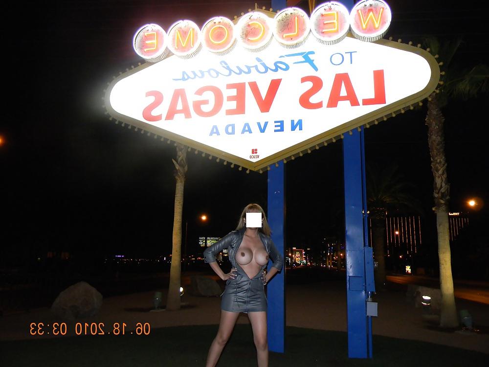 12P NINA latina flashing at the Las Vegas sign