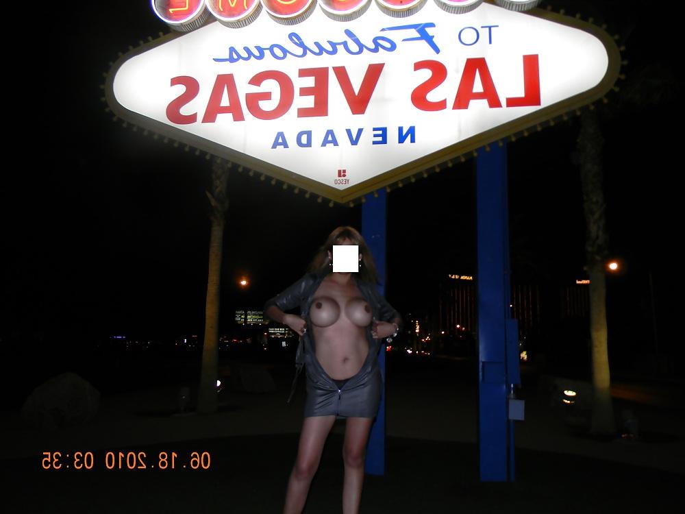 12P NINA latina flashing at the Las Vegas sign