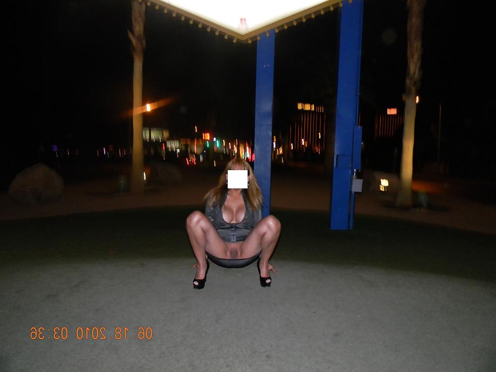 12P NINA latina flashing at the Las Vegas sign