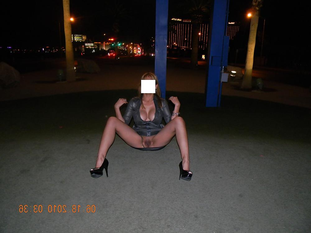 12P NINA latina flashing at the Las Vegas sign