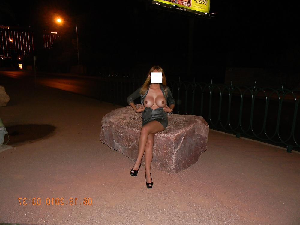 12P NINA latina flashing at the Las Vegas sign